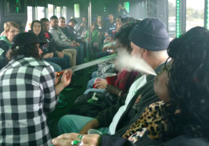 People smoking on a bus