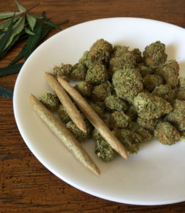 image of cannabis flowers and three joints