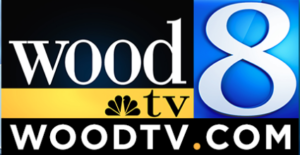 wood tv 8 logo